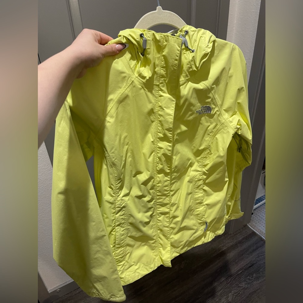 Gently used North face rain jacket/wind breaker.